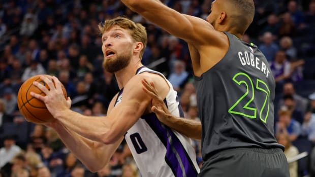 Mar 1, 2024; Minneapolis, Minnesota, USA; Sacramento Kings center Domantas Sabonis (10) works around Minnesota Timberwolves center Rudy Gobert (27) in the first quarter at Target Center. Mandatory Credit: Bruce Kluckhohn-USA TODAY Sports  